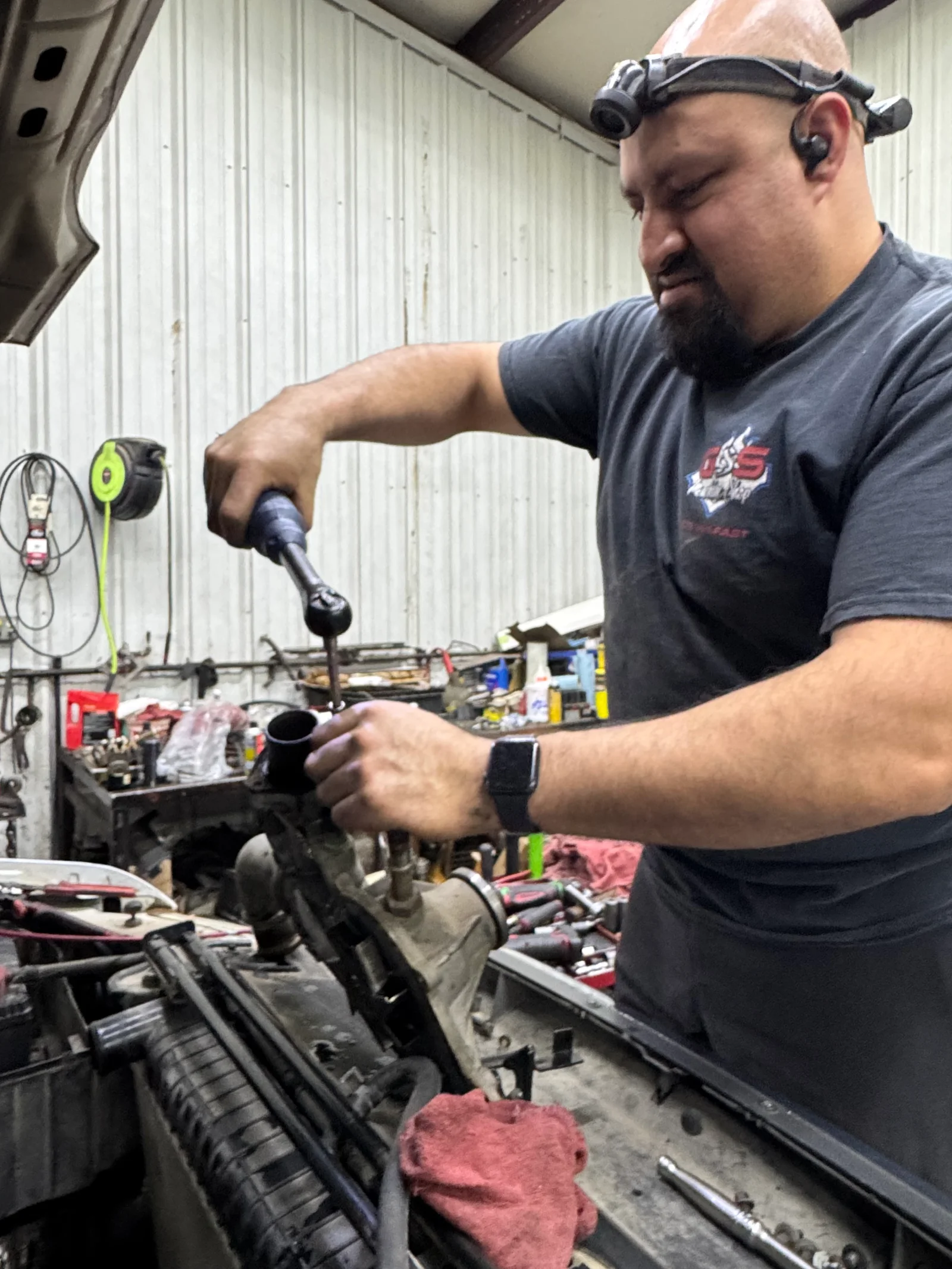 Miguel performing automotive repair at G&S Machine Shop