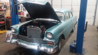 1956 Chevrolet Bel Air classic car in shop for automotive service and engine work