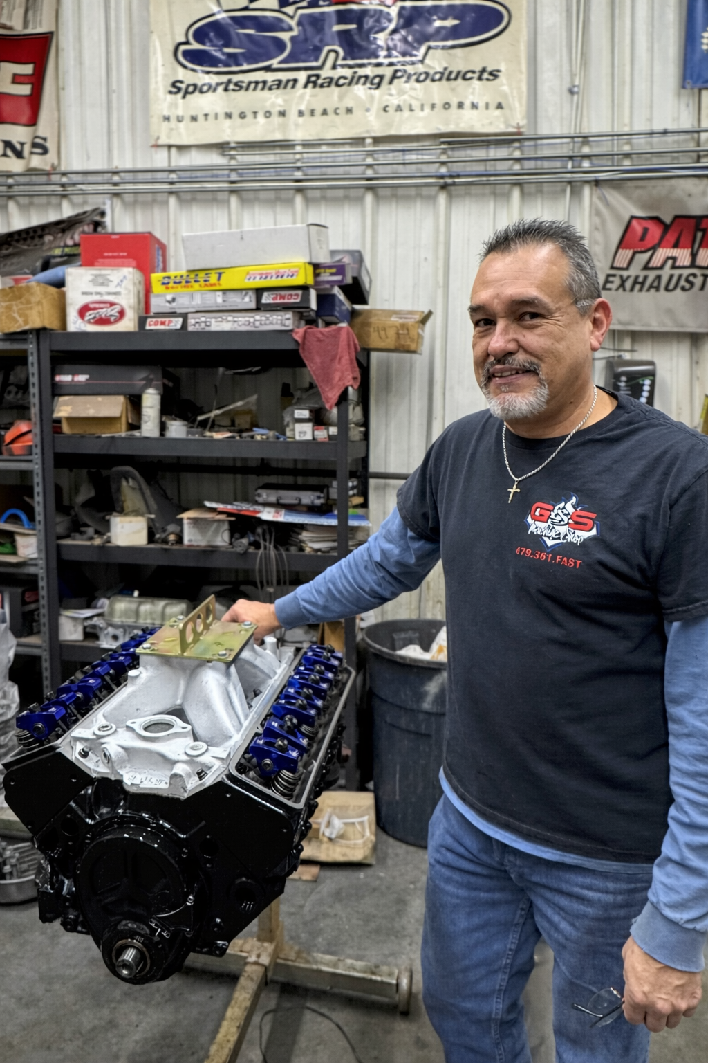 V8 engine assembly with cylinder heads and valvetrain components during engine rebuild service