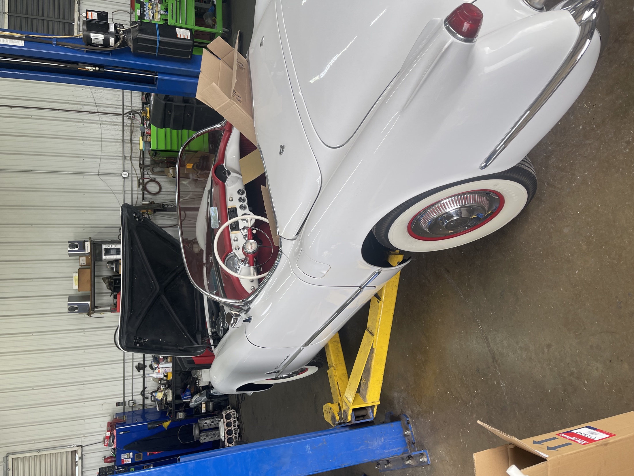 Chevrolet Corvette C1 classic convertible in shop for automotive service and engine work