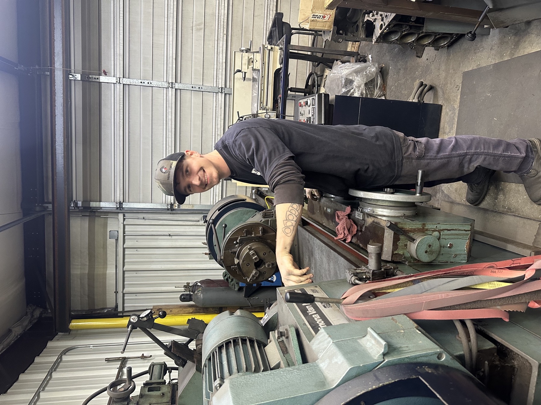 Seth setting up crankshaft grinder for precision grinding and engine rebuild work